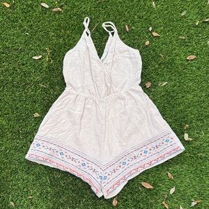 Lush Cream Romper with Colorful Embroidered Hem